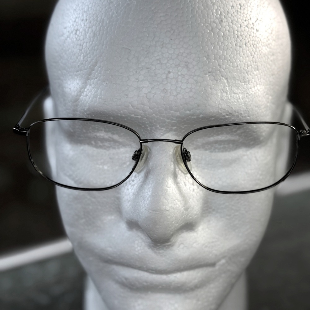 Flexon 600 by Marchon Gunmetal Oval Eyeglass Frames 54-18-145 with Theo Case‎